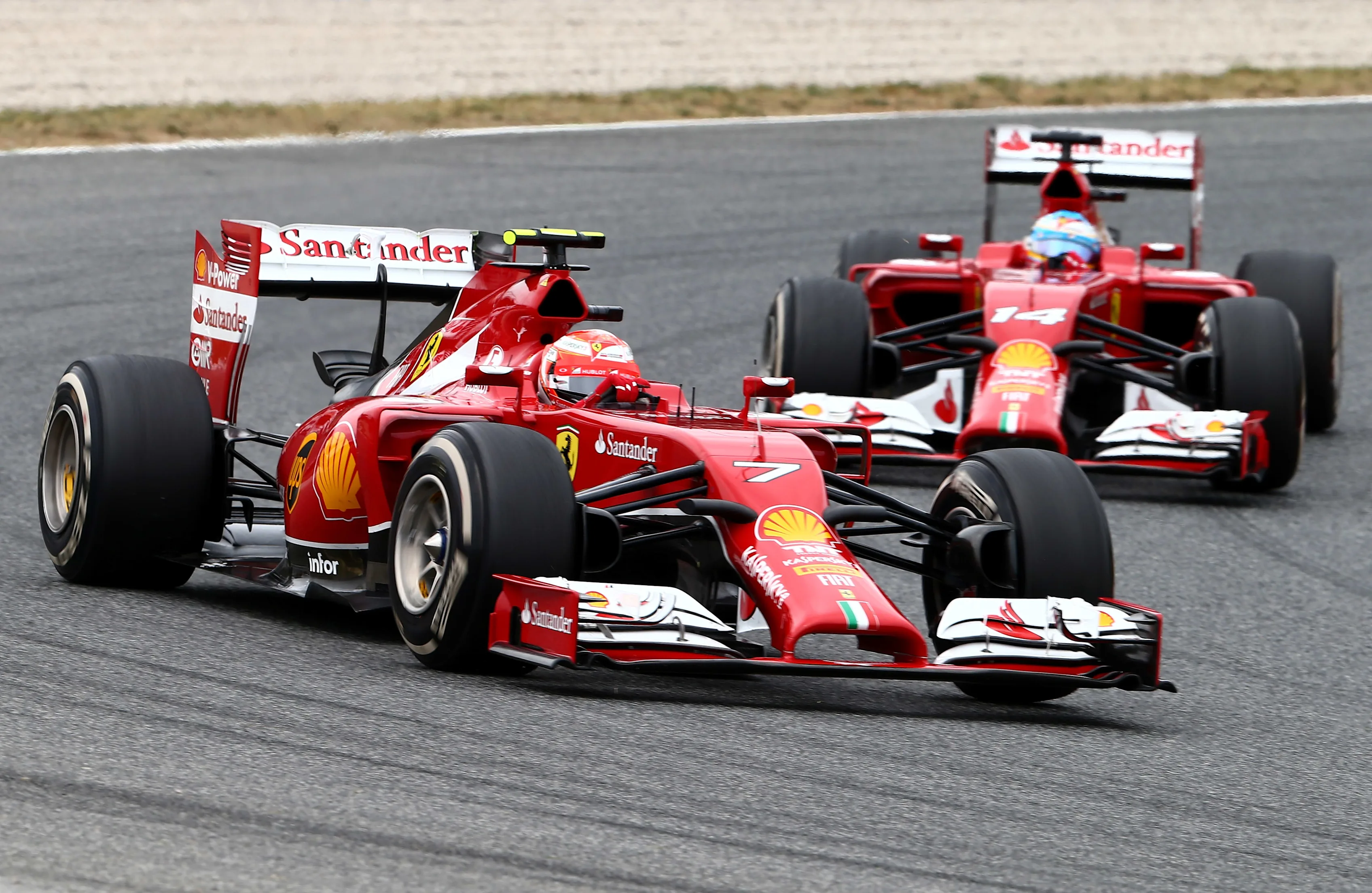 MONTMELO, SPAIN - MAY 11: Kimi Raikkonen of Finland and Ferrari is followed by teammate Fernando